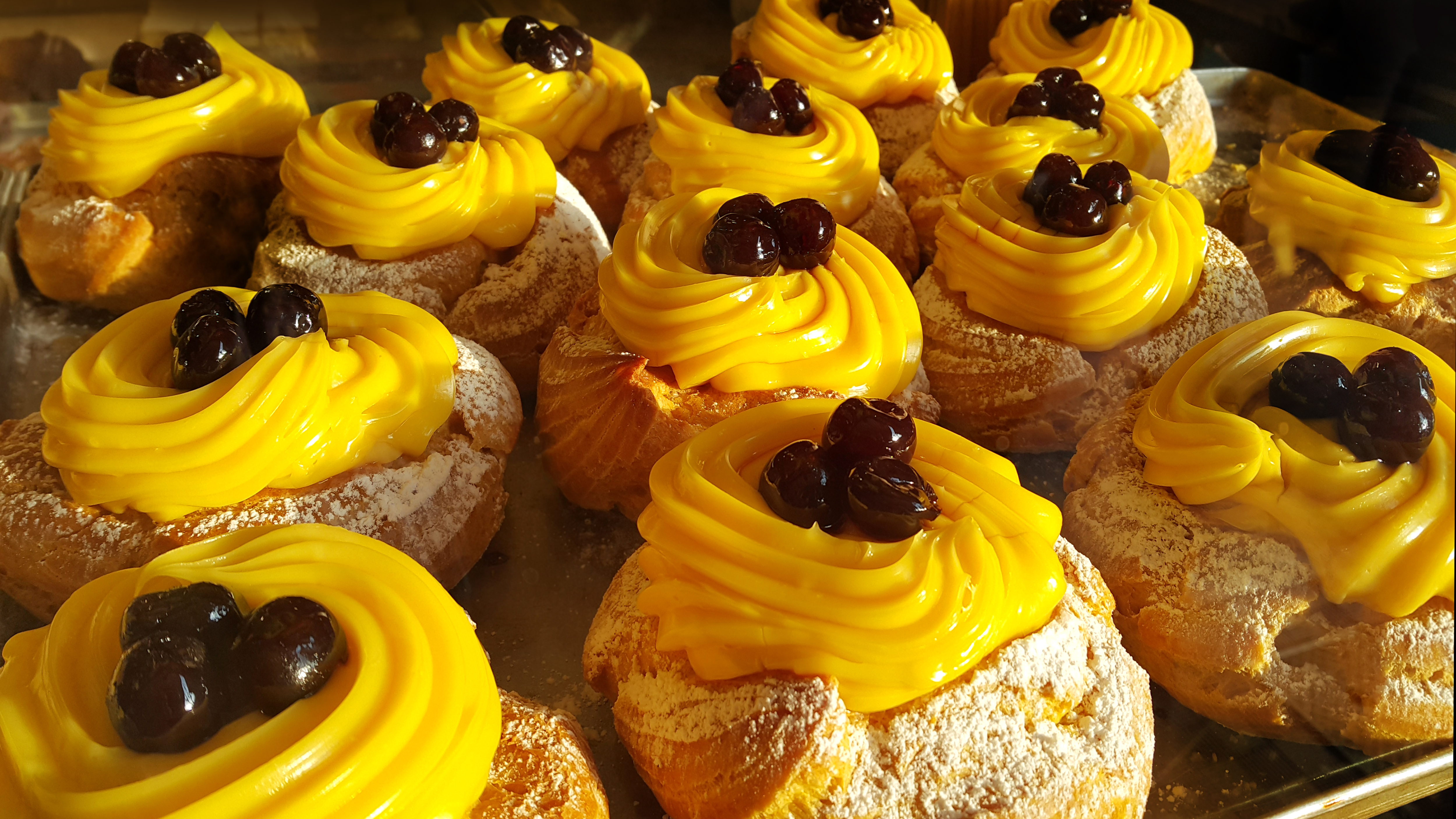 eclair with cream and cherry